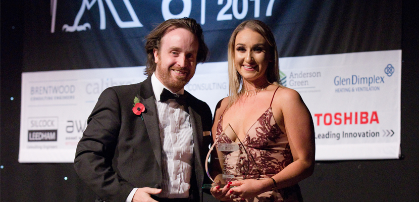 Emily collecting her award