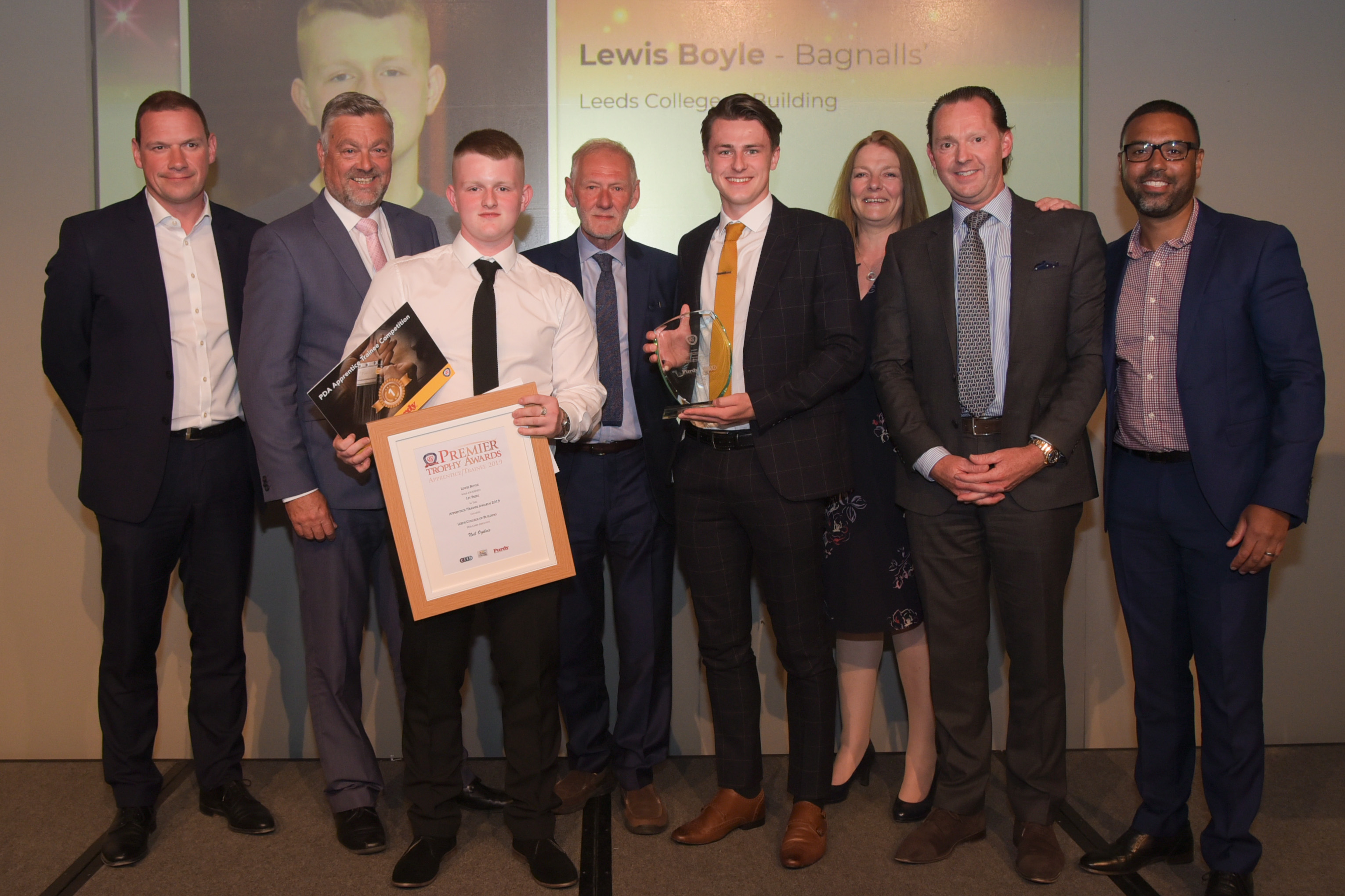 Apprentice Lewis Boyle Winner (L to R): Alistair McAuley (Akzonobel [Dulux Trade]), Rob Davis (Purdy), Lewis Boyle, Andrew Davis (Association of Painting Craft Teachers), Daniel Hallitt (Bagnalls), Joanne Gualda (Bagnalls), Stephen Bagnall (Bagnalls), Nathan Wilkins (CITB)