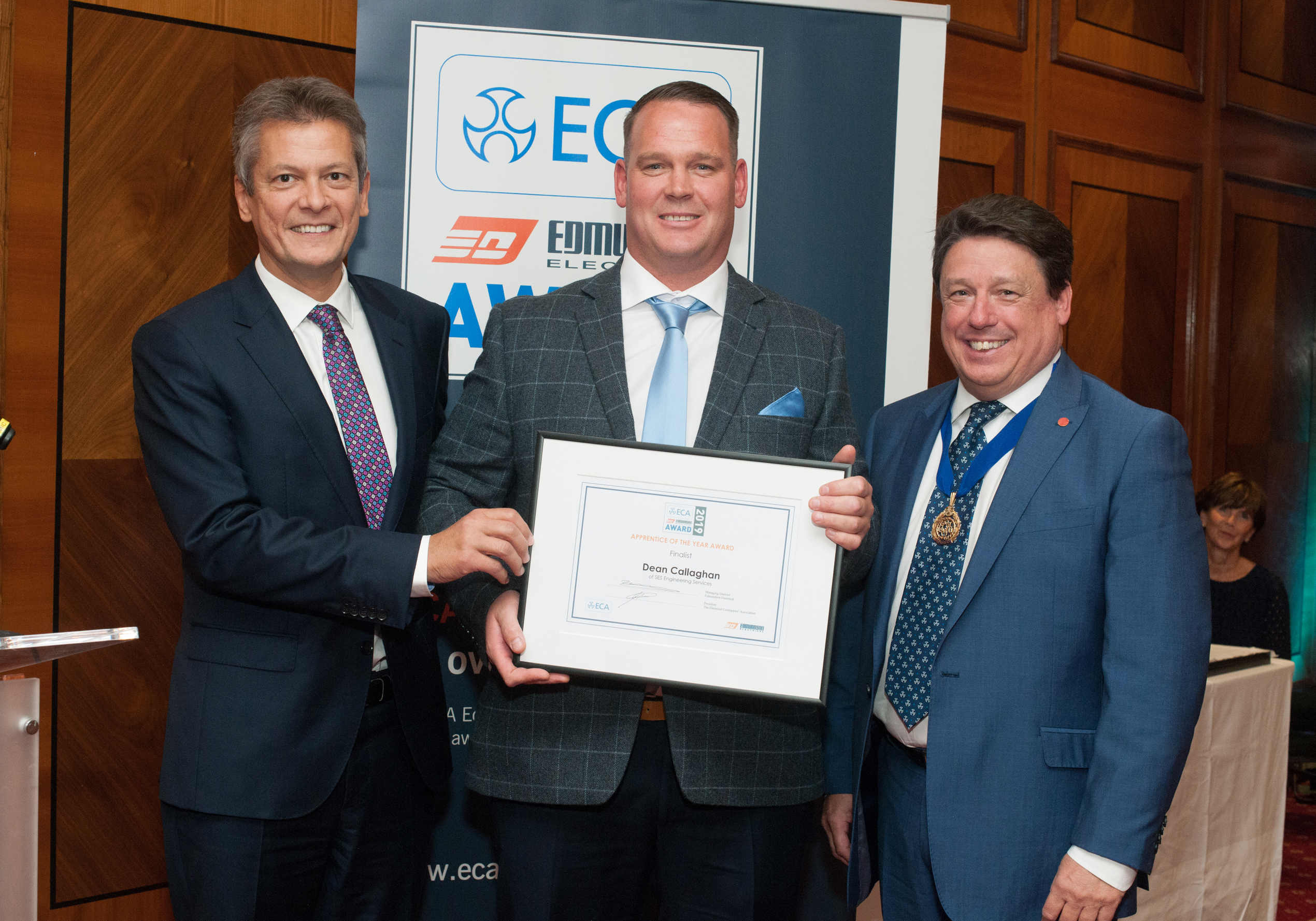 Dean is pictured collecting his certificate