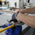 close-up of plumber using equipment