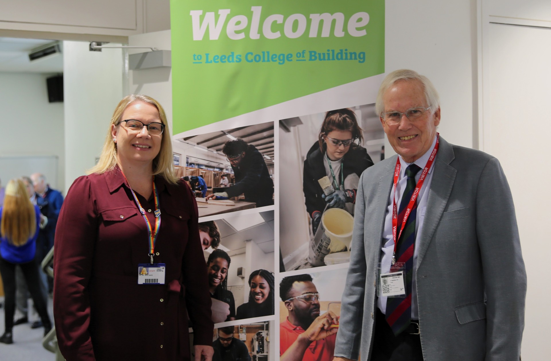 Nikki Davis and Geoff Rhodes outside of the lecture theatre