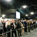 This photo depicts guests socialising before the start of the award presentation.