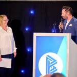 This photo depicts host Rich Williams giving an introductory speech at the awards.