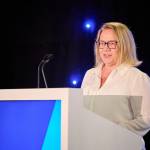 This photo depicts Leeds College of Buildings CEO & Principal, Nikki Davis, giving an introductory speech at the awards.