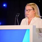 This photo depicts Leeds College of Buildings CEO & Principal, Nikki Davis, giving an introductory speech at the awards.