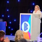 This photo depicts Leeds College of Buildings CEO & Principal, Nikki Davis, giving an introductory speech at the awards.