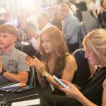 This photo depicts multiple guests at the awards sitting at their tables.