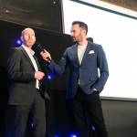 This photo depicts host Rich Williams introducing the LCB member of staff in charge of handing out the SBS awards.