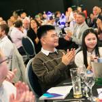 This photo depicts multiple guests at the awards sitting at their tables.
