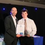 This photo depicts a student receiving their award.