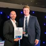 This photo depicts a student receiving their award.
