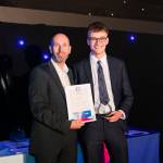 This photo depicts a student receiving their award.