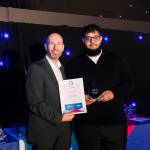 This photo depicts a student receiving their award.
