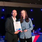 This photo depicts a student receiving their award.