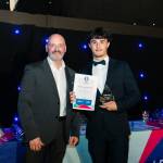 This photo depicts a student receiving their award.
