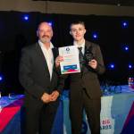 This photo depicts a student receiving their award.