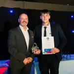 This photo depicts a student receiving their award.