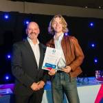 This photo depicts a student receiving their award.