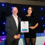 This photo depicts a student receiving their award.