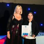 This photo depicts a student receiving their award.