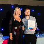 This photo depicts a student receiving their award.