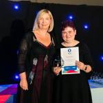 This photo depicts a student receiving their award.