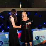 This photo depicts a student receiving their award.