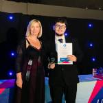This photo depicts a student receiving their award.