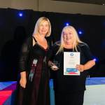 This photo depicts a student receiving their award.