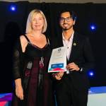 This photo depicts a student receiving their award.