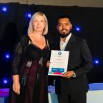 This photo depicts a student receiving their award.