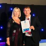 This photo depicts a student receiving their award.