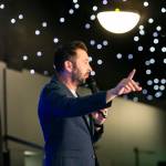 This photo depicts host Rich Williams giving a closing speech at the awards.