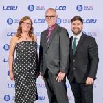 This photo depicts a staff team photo against the LCBU photo wall.