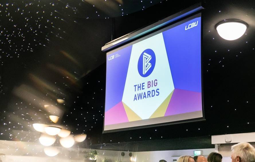 This photo depicts one of the digital presentation screens at the awards.