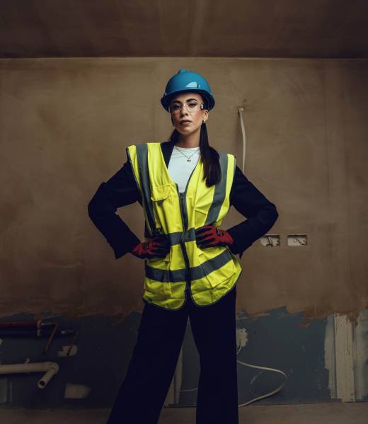 This image depicts a female LCB student in full safety gear.